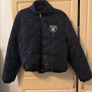 Wear by Erin Andrew’s black puffer jacket